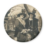 2 ladies with hats with feathers magnets