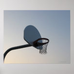 A basketball backboard hoop and net. Clear blue Print