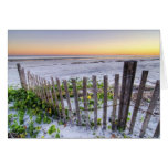 A Beach Fence at Sunset Greeting Cards