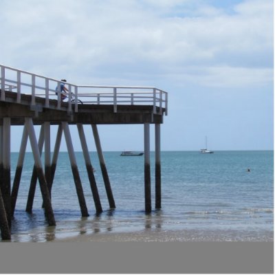 A Boy on a Bike at the Hervey Bay Ocean Pier. by realaussie