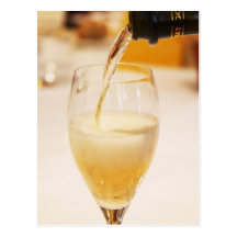 A champagne glass flute being filled with Gosset Post Card