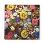 A Collage of Buttons including Yellow Wheel Button