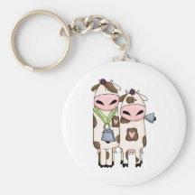 a couple of cute moo cows keychains