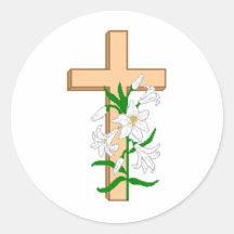 A Cross Standing Behind A White Flower Round Stickers