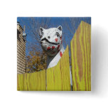 A dinosaur in the Court Yard of Wonders Pinback Buttons