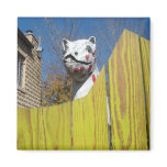 A dinosaur in the Court Yard of Wonders Refrigerator Magnet