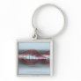 A DNA strand in a capsule Key Chains