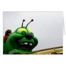 A green caterpillar goofy fair ride image greeting cards