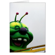 A green caterpillar goofy fair ride image greeting card
