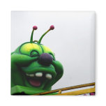A green caterpillar goofy fair ride image magnets
