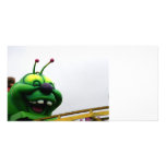 A green caterpillar goofy fair ride image photo cards