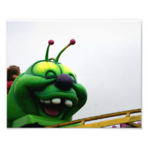 A green caterpillar goofy fair ride image photo art