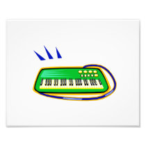 A green keytar with a blue strap graphic, art photo