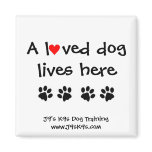 A loved dog lives here Magnet