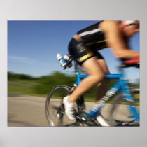 A male athelete training for a triathlon at a print