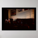 a man sitting in a room alone posters