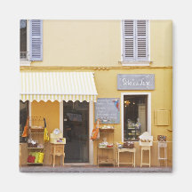 A market street in the old town with a shop magnets