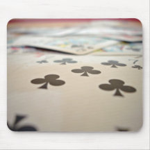 A pile of playing cards mouse pads