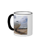 A RC-135V/W Rivet Joint aircraft mugs