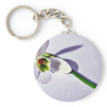 A Single Snowdrop On The Table keychains