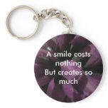 A smile costs nothing key chains