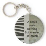 A smile costs nothing keychain