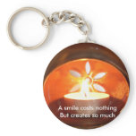 A smile costs nothing keychains