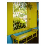A stark contrast of yellow and blue postcards