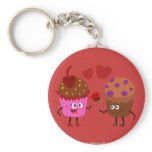 a Stud Muffin giving a flower to a Cupcake Keychain