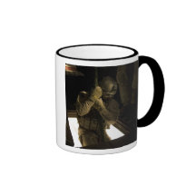A US Air Force pararescueman begins his descent Mugs