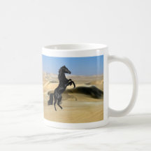 A wild rearing black stallion coffee mug