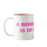 A WOMAN'S PLACE IS IN CONTROL MUGS