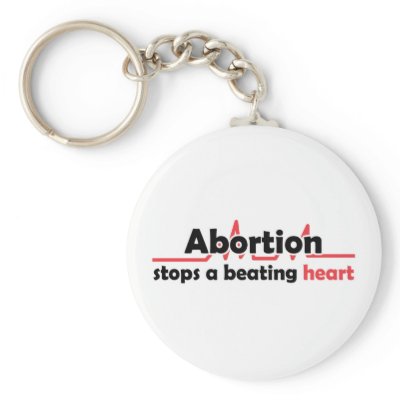 Abortion stops a beating heart keychains by bbdesignsco