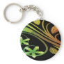 Abstract Green and Orange Flowers on Black Keychain