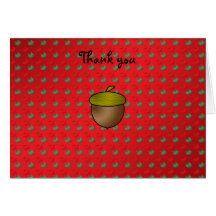 Acorn on red background with green snowflakes greeting cards