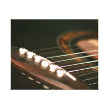 acoustic guitar bridge pins close up.jpg stretched canvas print