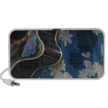 Acoustic Guitar Edge Against Blue Flower Dress Notebook Speaker
