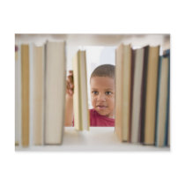 African American boy selecting book Post Card