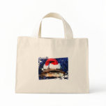 African sideneck turtle wearing santa hat tote bags