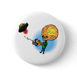 Alien boy with toy flying saucer pinback button