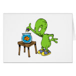 Alien feeding goldfish greeting card