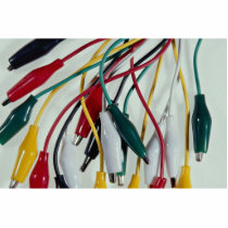 Alligator clips spread on white background photo cut out