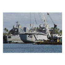An F-15 Eagle gets a lift from a barge crane Art Photo