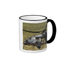 An HH-60 Pave Hawk flies over the desert Coffee Mugs