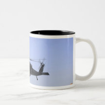 An HH-60G Pave Hawk taking off from Camp Bastio Coffee Mug