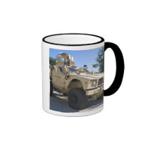 An Oshkosh M-ATV mugs