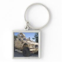 An Oshkosh M-ATV keychains
