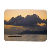 An outrigger canoe team practices off the coast flexible magnets