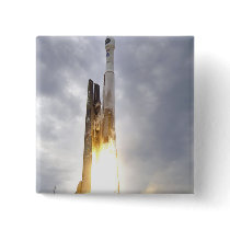 An United Launch Alliance Atlas V rocket lifts Pinback Button