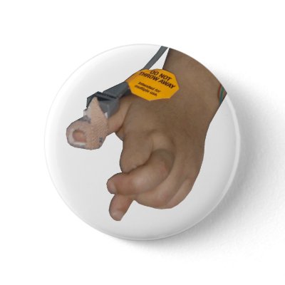 Andy's hand during stem cell infusion button by a3vino